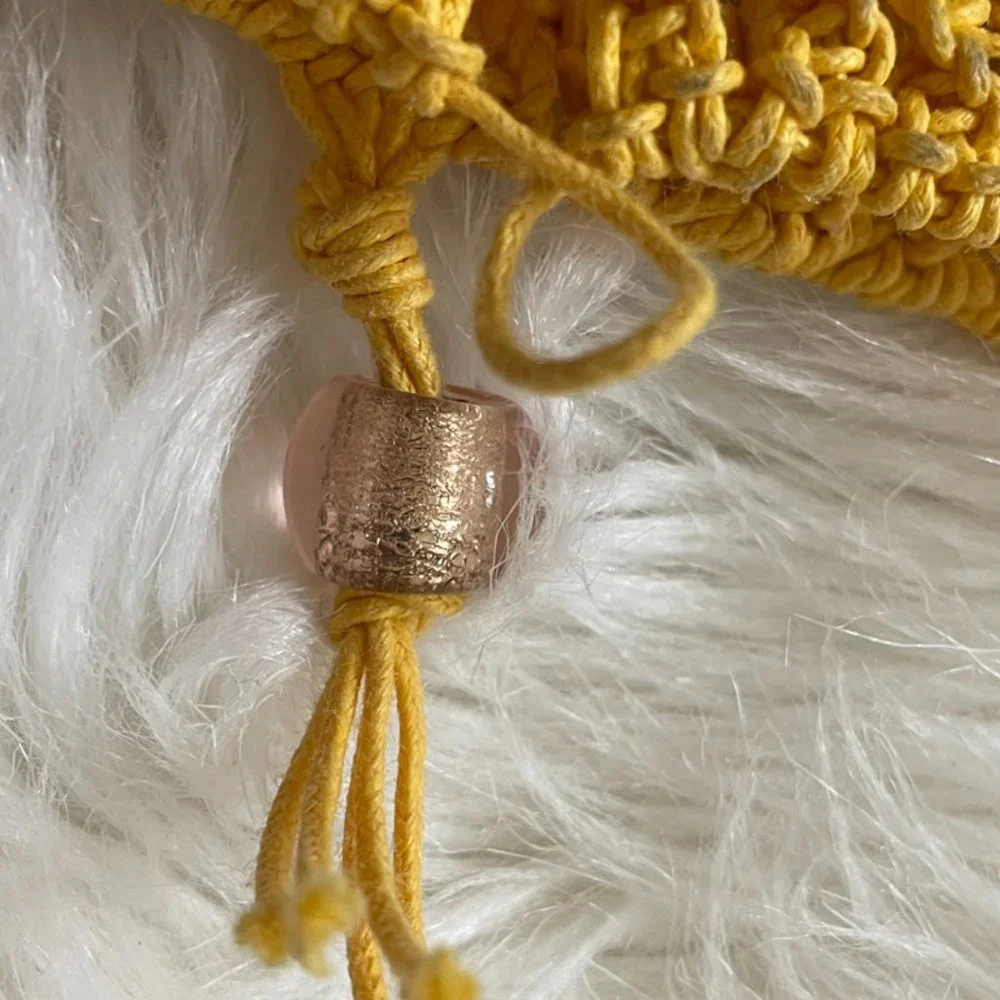 Yellow woven Macrame pouch for small cell phone